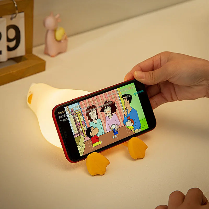 OuXean Fun Lying Duck Turning Duck Silicone Night Light Creative LED USB Table Light Charging Fun Mobile Phone Bracket