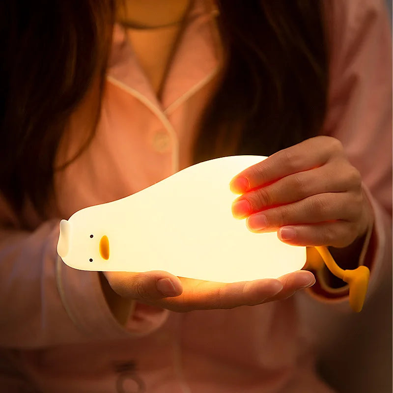 OuXean Fun Lying Duck Turning Duck Silicone Night Light Creative LED USB Table Light Charging Fun Mobile Phone Bracket